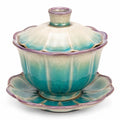 Keramische Teetasse mit Deckel und Unterteller, Blau-Grün, Blumenform