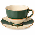 Elegante grün-goldene Porzellantasse mit Untertasse