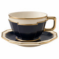 Elegante Teetasse mit Goldrand und Untertasse in Dunkelblau