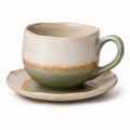 Handgefertigte Keramik-Teetasse mit Untertasse im Farbverlauf Beige/Grün